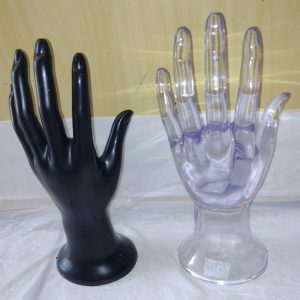 Expositor, mão, p/aneis, transparente/preta.